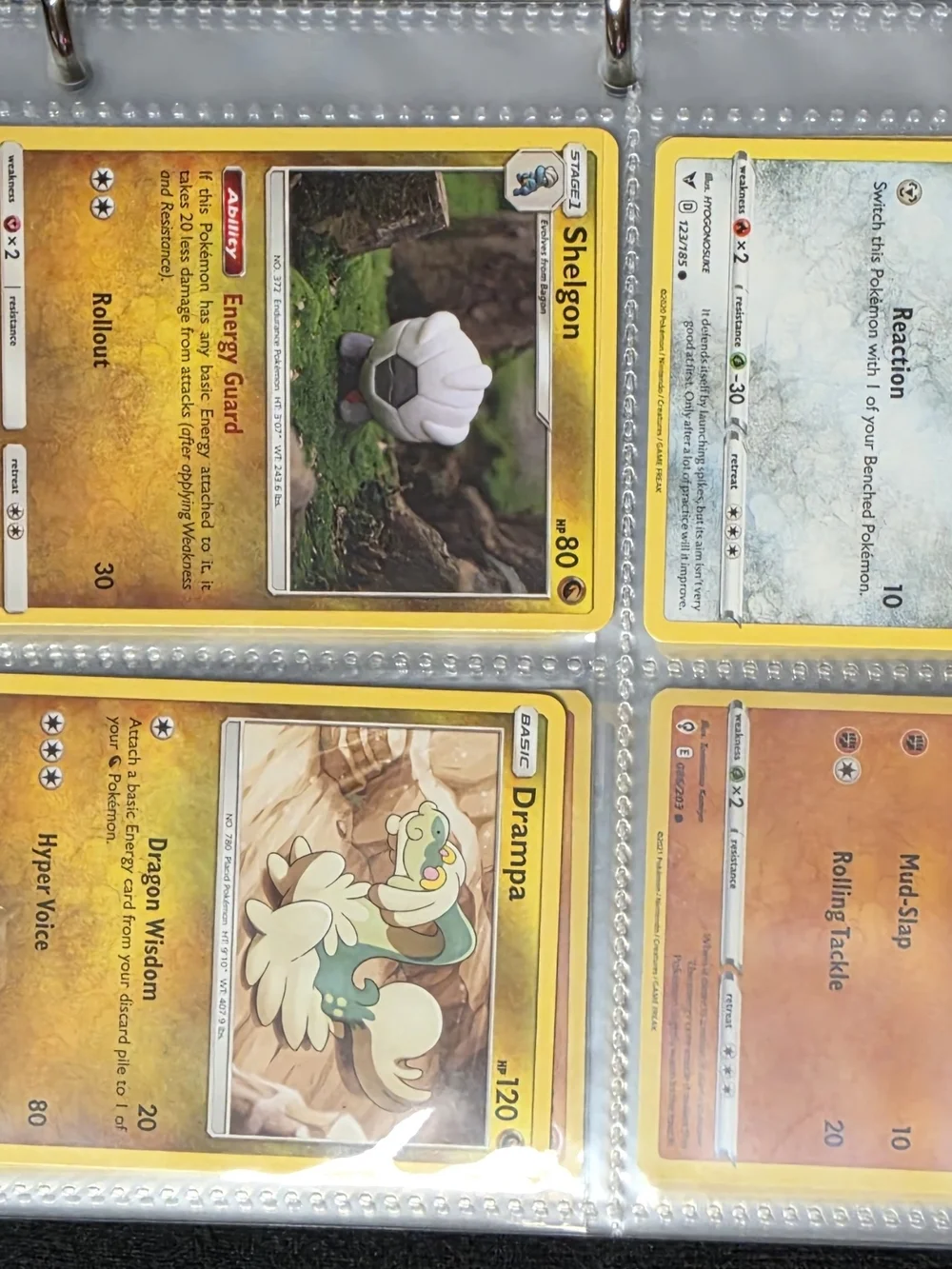 Pokemon Red and Blue Pokemon Card Binder And 53 Pokemon Cards.